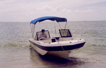 Fred getting close to shore with boat
